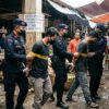 POLRES BANGKALAN SIKAT DUA PELAKU PENYEMPROTAN AIR CABAI DI PASAR PATEMON, STATUS TERSANGKA RESMI DISANDANG!